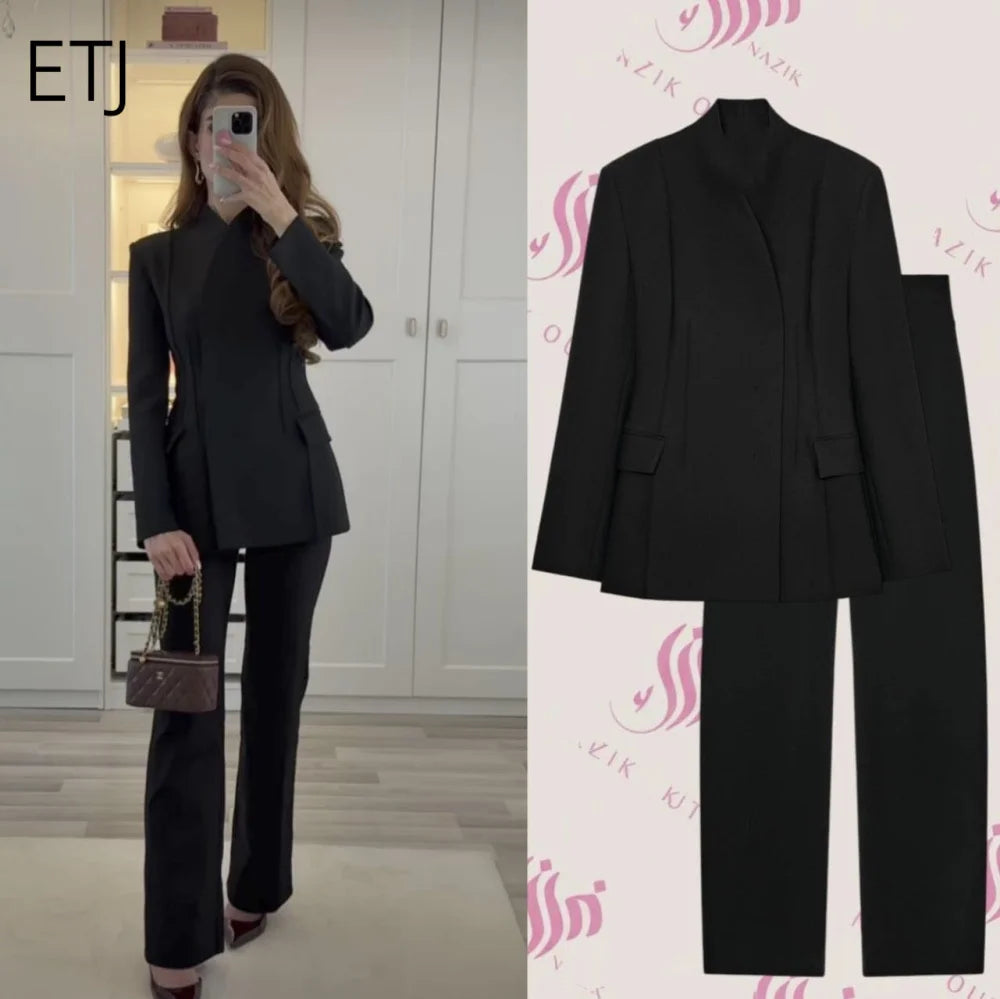 Three-dimensional cut high collar slim suit jacket & matching casual trousers