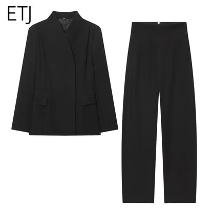 Three-dimensional cut high collar slim suit jacket & matching casual trousers